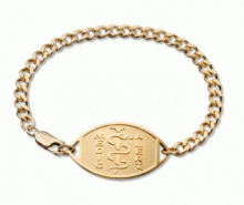 10 karat gold classic embossed medical ID bracelet with oval emblem and logo