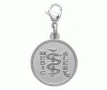 Round stainless steel medical ID accessory with MedicAlert logo and a secure lobster clasp