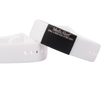 Performance silicone Medical ID bracelet with a white band and a black colored rectangular emblem