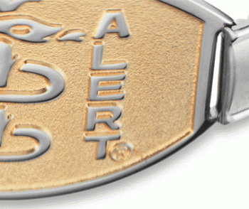 A close-up view of two tone large medical ID bracelet with silver stretch band and gold oval MedicAlert emblem and logo