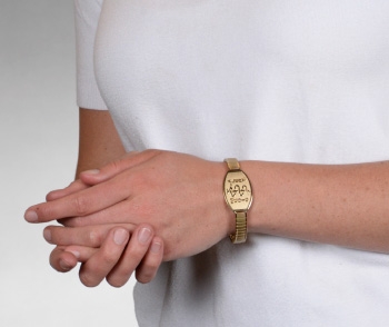 Stretch Band Large Medical ID Bracelet Gold with logo on wrist