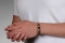 Sleek Medical ID Bracelet Rose Gold with white logo on wrist